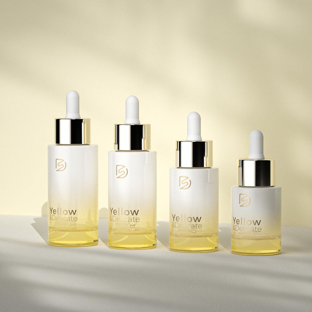 Premium yellow gradient glass dropper bottles for skincare serums in 20ml to 50ml sizes